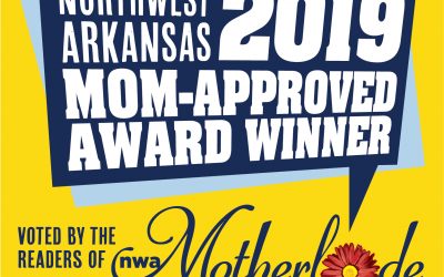 Northwest Arkansas 2019 Mom-Approved Award Winner graphic highlighting Henry Eye Clinic's recognition as a top eye care clinic by NWAMotherlode.com readers.